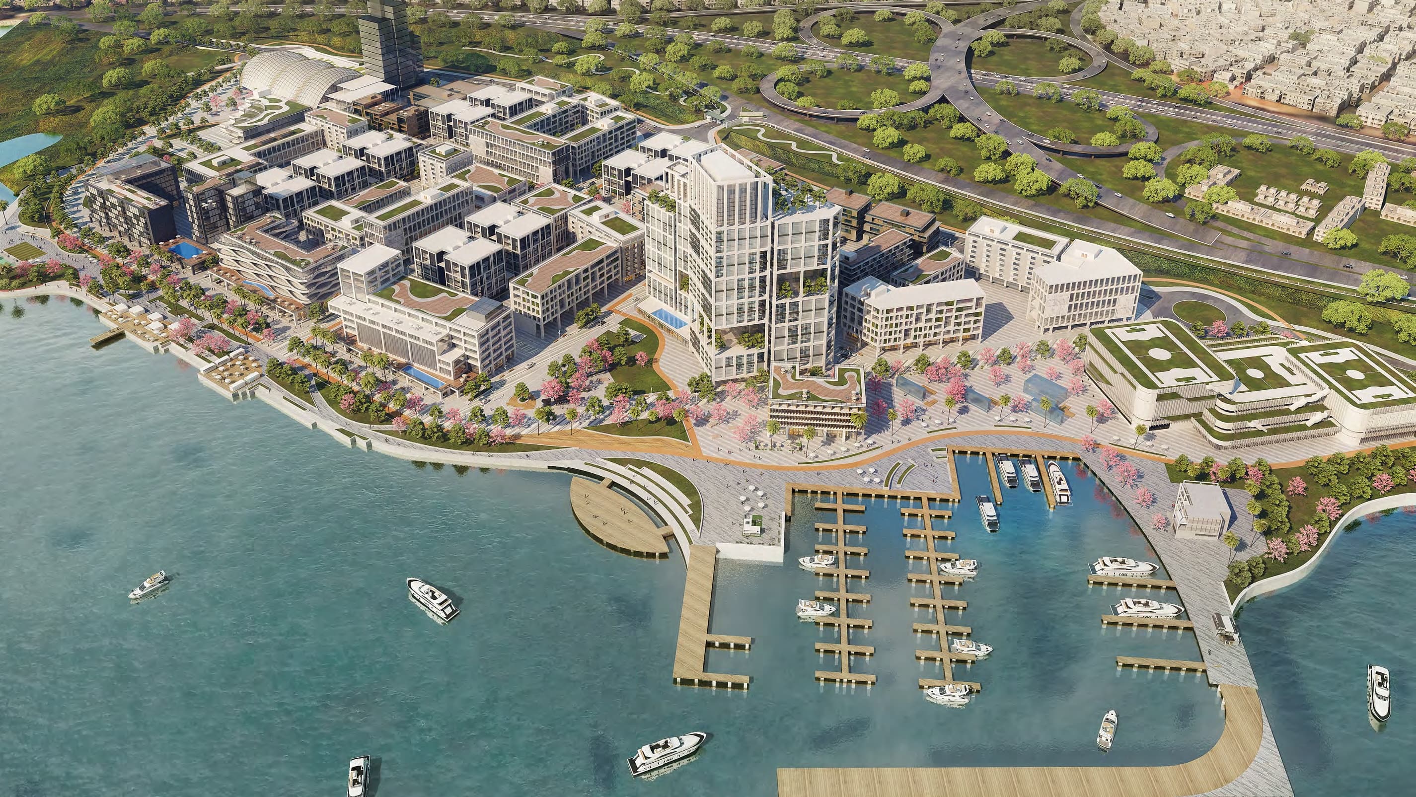 The promenade along the lagoon edge with the Lagos skyline behind it