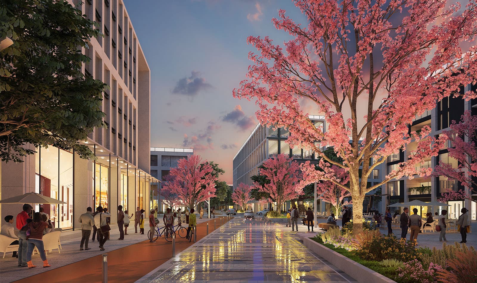 A pedestrian high street at dusk: blossom trees, lit shopfronts, cyclists and people strolling